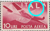 “ punto bianco aderente alla L in alto “