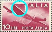 “ marcato tratto di colore tra l’ala e I di Italia “